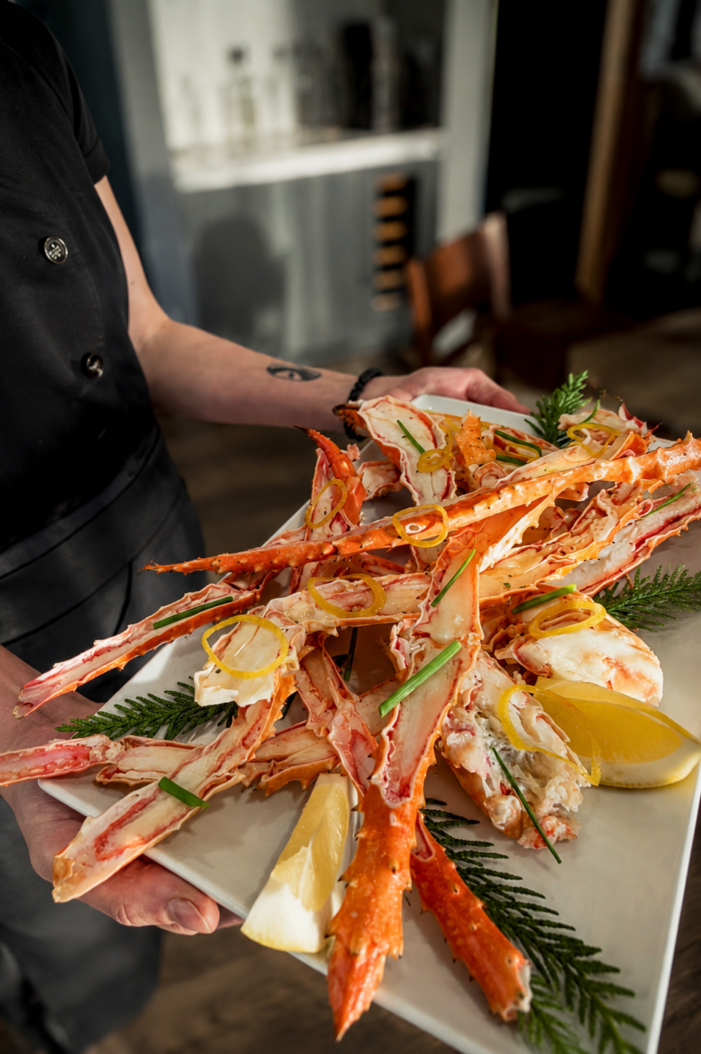 Crab legs and seafood platter served at a private dinner